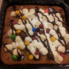 A picture of Gooey chocolate chip cookie bar.