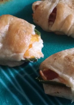 A picture of Stuffed jalapeño roll-ups.