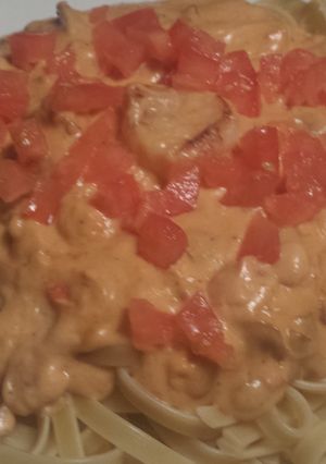 A picture of Blacken tilapia with fettuccine.