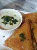 Homemade veg samosas with hari chutney