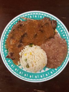 Una foto de Chuletas de res bañadas en salsa