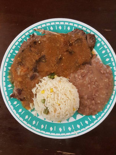 Una foto de Chuletas de res bañadas en salsa