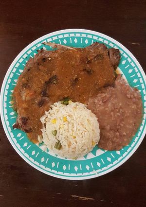 Una foto de Chuletas de res bañadas en salsa