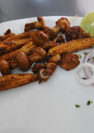 A picture of Tandoori Mushrooms and Babycorn.