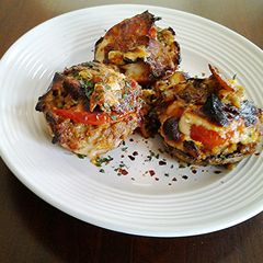 A picture of Meat Stuffing Filled Stuffed Mushrooms.