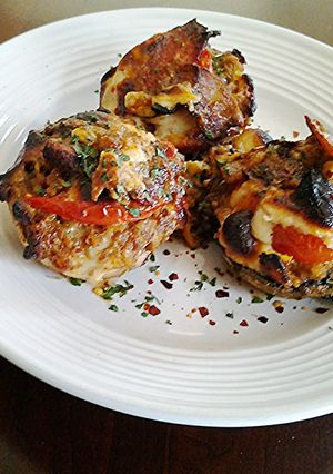 A picture of Meat Stuffing Filled Stuffed Mushrooms.
