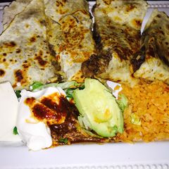 Ray's' The Ultimate Quesadilla Platter A picture of Ray's' The Ultimate Quesadilla Platter.