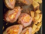 Una foto de carnes al horno