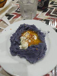 Una foto de Puré de patatas violetas
