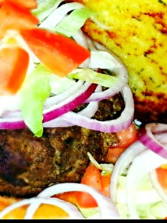 A picture of Mike's Gourmet Garlic Mozterella Burgers.