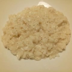 A picture of Risotto Cacio e Pepe.