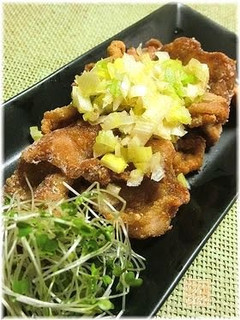 A picture of Crispy Thinly Sliced Pork with Japanese Leeks and Salty Sauce.