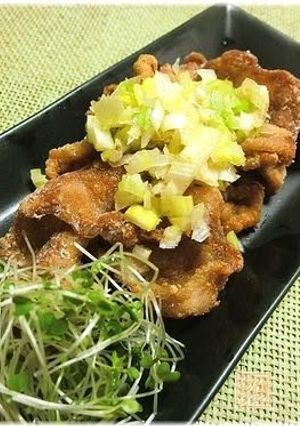 A picture of Crispy Thinly Sliced Pork with Japanese Leeks and Salty Sauce.