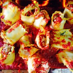 A picture of Italian Sausage & Spinach Lasagne Rolls.