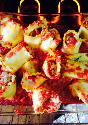 A picture of Italian Sausage & Spinach Lasagne Rolls.