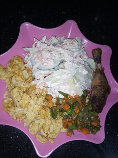 A picture of Salad + stir fried veggies + fried eggs + grilled chicken.