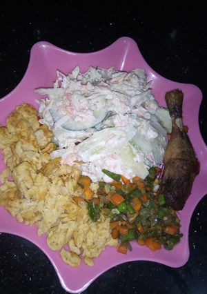 A picture of Salad + stir fried veggies + fried eggs + grilled chicken.