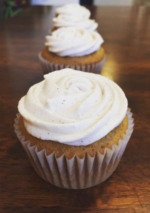 A picture of Pumpkin Cupcakes with Cinnamon Cream Cheese Frosting.