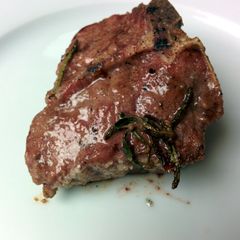 A picture of Grilled salt and pepper lamb loin chop.