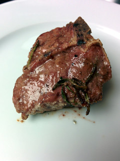 A picture of Grilled salt and pepper lamb loin chop.