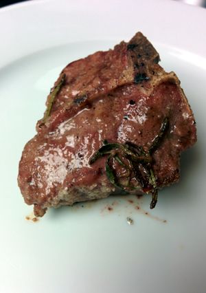 A picture of Grilled salt and pepper lamb loin chop.