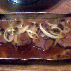 smothered steaks w/ mushroom and onions A picture of smothered steaks w/ mushroom and onions.