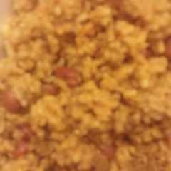 A picture of Dirty Rice and Red Beans.