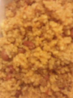 A picture of Dirty Rice and Red Beans.