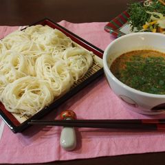 Dipped Somen Noodles In Sesame Dipping Sauce A picture of Dipped Somen Noodles In Sesame Dipping Sauce.