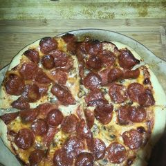A picture of Pepperoni & Mushroom pizza.