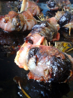 A picture of Devils On Horseback with Rosemary.