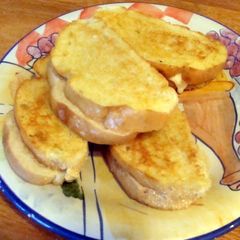 A picture of taisen's cheesy tomato grilled cheese.
