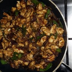 A picture of chinese chicken with rice.