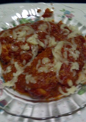 A picture of chicken in italian sauces.