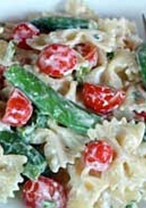 A picture of sugar snap pea & cherry tomato pasta.