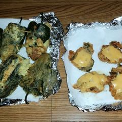 A picture of Stuffed poblano peppers with side meat cheddar patties.
