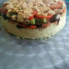 A picture of Maklouebah (upsidedown veggie/rice/chicken pot).