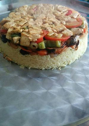 A picture of Maklouebah (upsidedown veggie/rice/chicken pot).