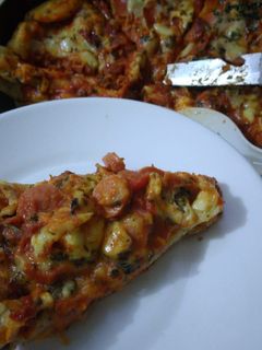 Una foto de Pizza