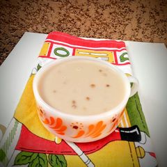 A picture of Peanut pudding with wheat grains.