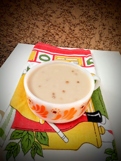 A picture of Peanut pudding with wheat grains.