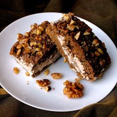 A picture of BottleGourd Brownie Walnut Ice cream Sandwiches.