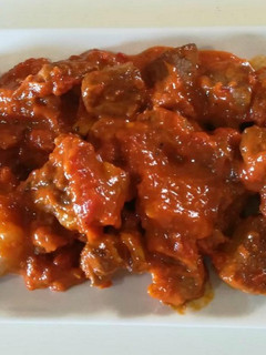 Una foto de Magro con tomate