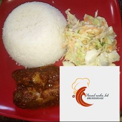 A picture of White rice with stew and salad.