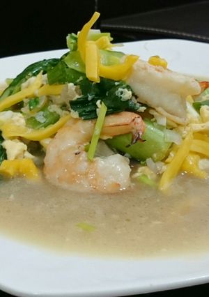 A picture of Shrimp And Choy Sum With Jackfruit In Egg Broth.