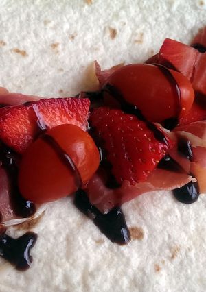 A picture of Sophie's strawberry balsamic cured ham wrap.