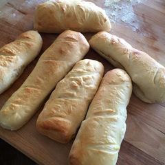 A picture of mini french bread loaves.