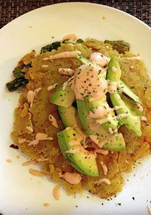A picture of Authentic Mofongo with avocado and mayo ketchup.