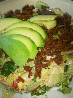 A picture of Shredded Brussels Sprouts & Bacon Avocado Salad.