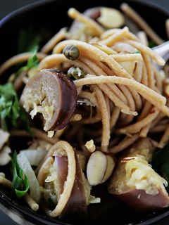 A picture of Whole Wheat Spaghetti, Spaghetti Squash, Japanese Eggplant, Capers and Toasted Almonds.